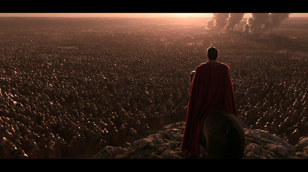 A monumental 16:9 vertical tracking shot across a vast ancient Roman battlefield at sunset. Thousands of legionaries with curved shields are arrayed…